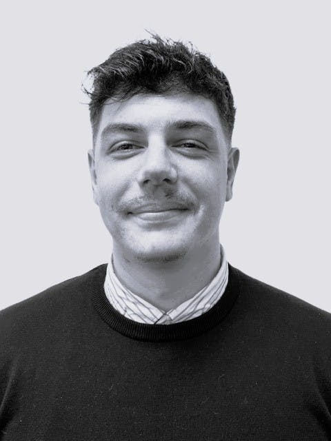 Black and white head and shoulders photo of Matt Cutler